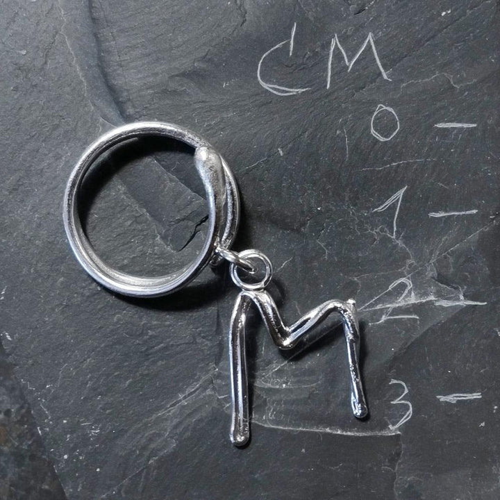 anello regolabile con M