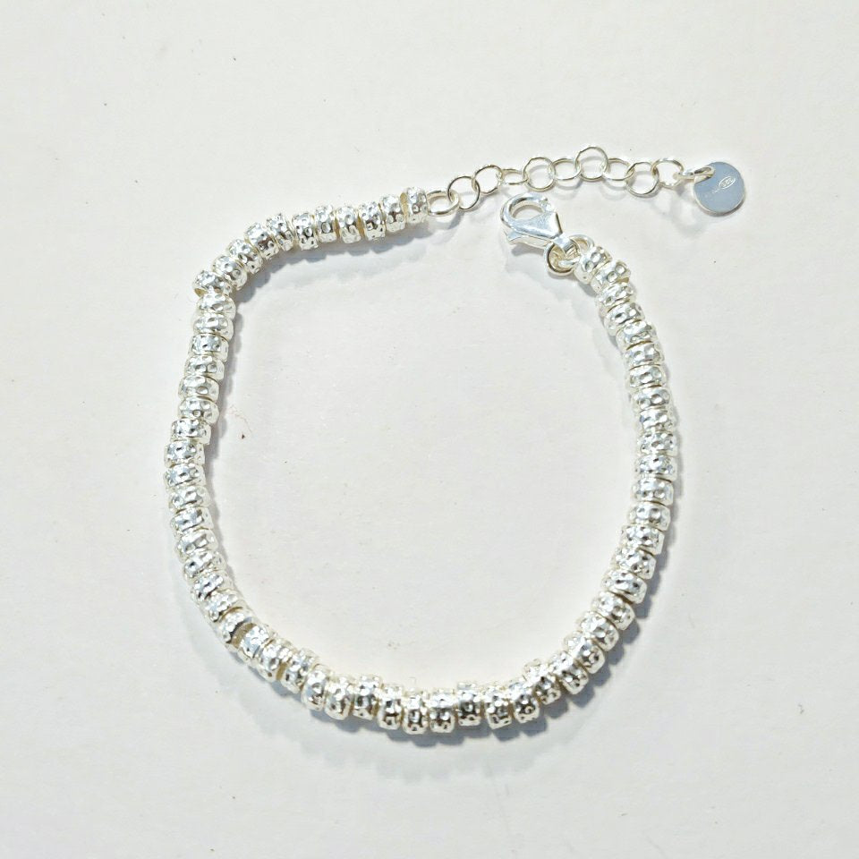 SILVER BRACELET with small hammered discs