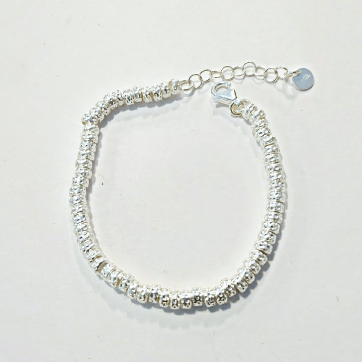 SILVER BRACELET with small hammered discs