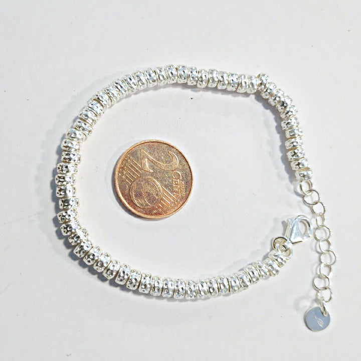 SILVER BRACELET with small hammered discs