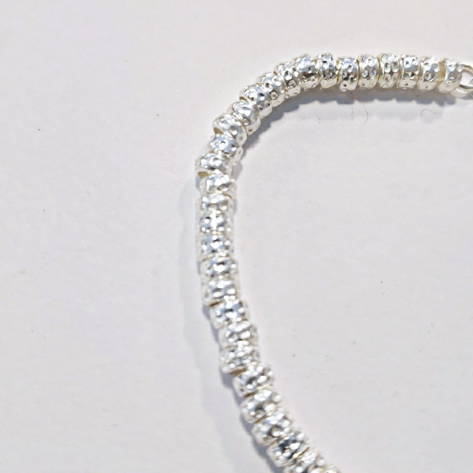 SILVER BRACELET with small hammered discs