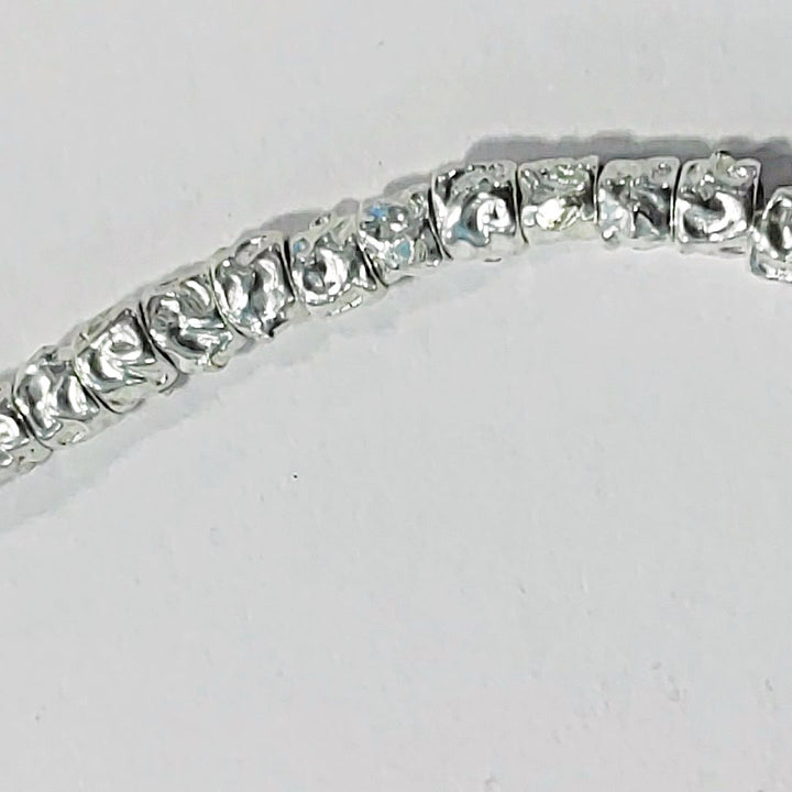 SILVER BRACELET with small hammered tubes