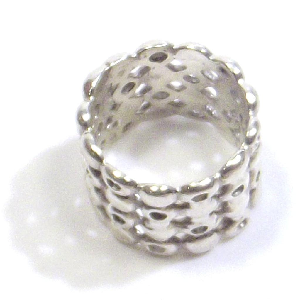 Polished 925 silver ring. DOTTED BAND