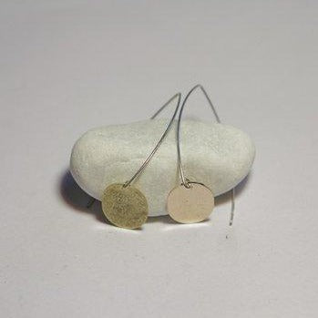 Orecchini in argento con medaglietta