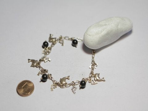 Bronze bracelet with dolphins