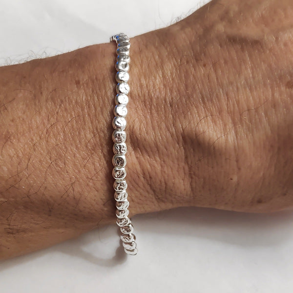 BRACCIALE ARGENTO a tubi piatti martellati grandi | Gioielli in argento