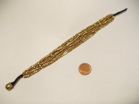 Naga ethnic bracelet in faceted brass