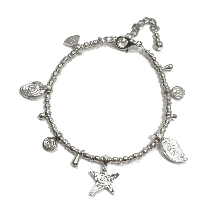 Bracciale artigianale in ottone STELLA SPIRALE FIORI | Bracciale ottone