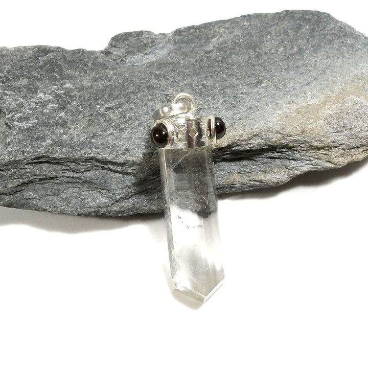 Pendant with brass stone Handcrafted pendant Rock crystal and garnet | JEWELRY WITH STONES