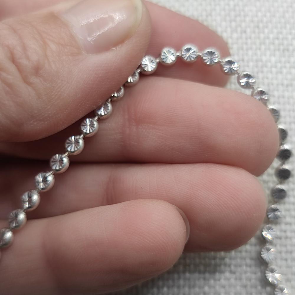 BRACCIALE con sfere piatte decorate in argento 925 - MEERPET