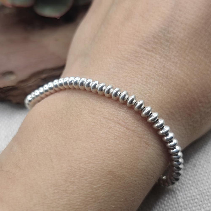 BRACCIALE con sfere schiacciate in argento 925 - MANGALAGIRI