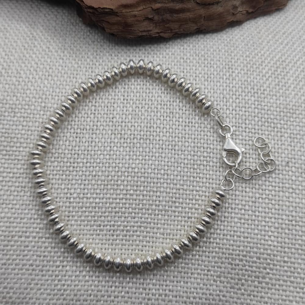 BRACCIALE con sfere schiacciate in argento 925 - MANGALAGIRI