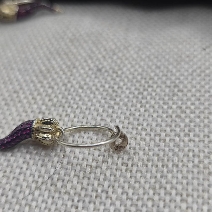 Orecchini artigianali in argento dorato con zirconi - KARMA