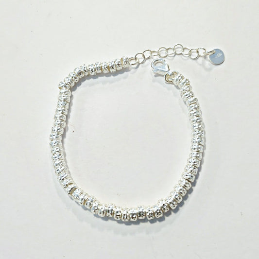BRACCIALE ARGENTO a dischi martellati piccoli – immagine1