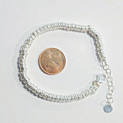 BRACCIALE ARGENTO a dischi martellati piccoli – immagine2