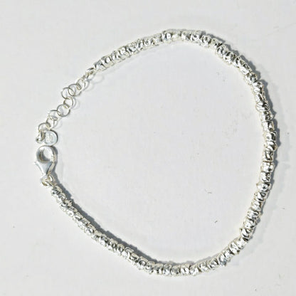BRACCIALE ARGENTO a tubi martellati piccoli