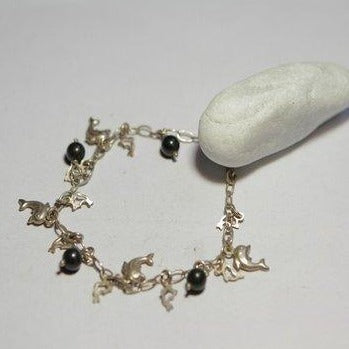 Bracciale bronzo con delfini