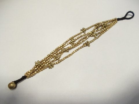 Bracciale etnico Naga in ottone pendenti