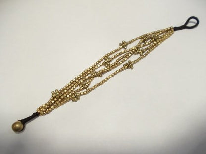 Bracciale etnico Naga in ottone pendenti