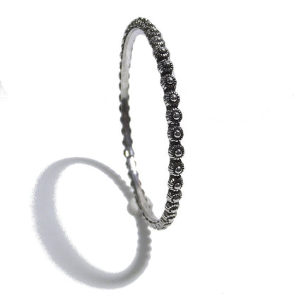 Bracciale etnico FLOR a cerchio in argento - rigido | Gioielli etnici ilmodndodiwit.com