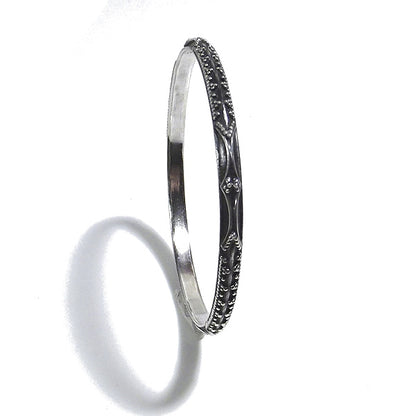 Bracciale etnico JIMIT a cerchio in argento - rigido | Gioielli etnici ilmondodiwit.com