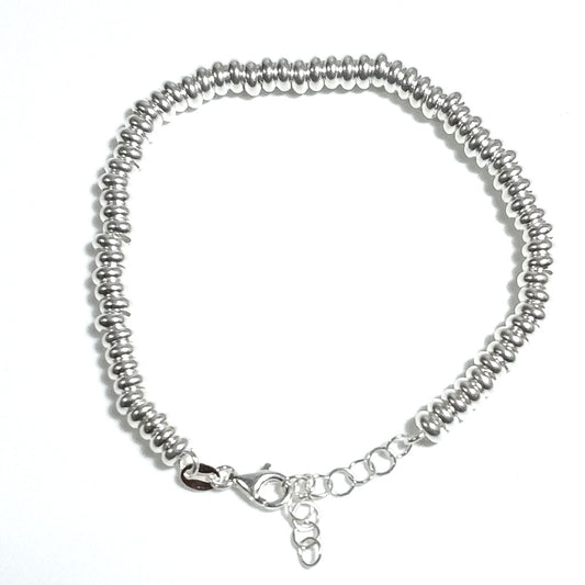 BRACCIALE ARGENTO a dischi piccoli Gioielli pomellato