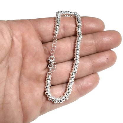 BRACCIALE ARGENTO a dischi piccoli Gioielli pomellato pandora
