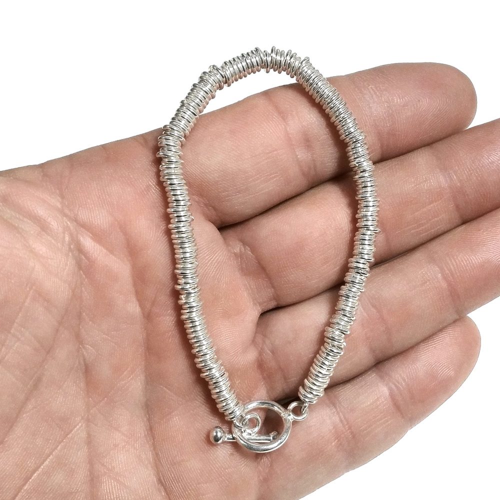 BRACCIALE ARGENTO a dischi pieni gioielli argento pomellato