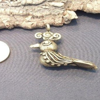 Ciondolo etnico ottone Naga bird