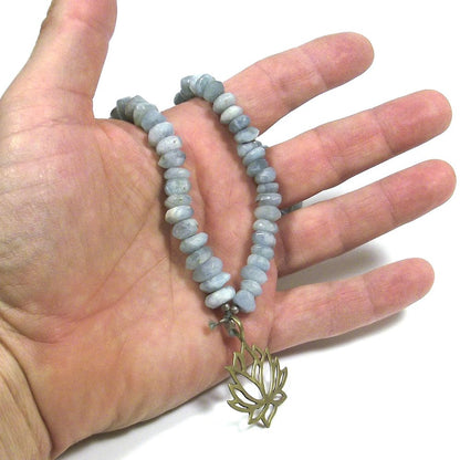 GIOIELLI etnici | COLLANA con acquamarina taglio rosetta e FIORE di LOTO – immagine4